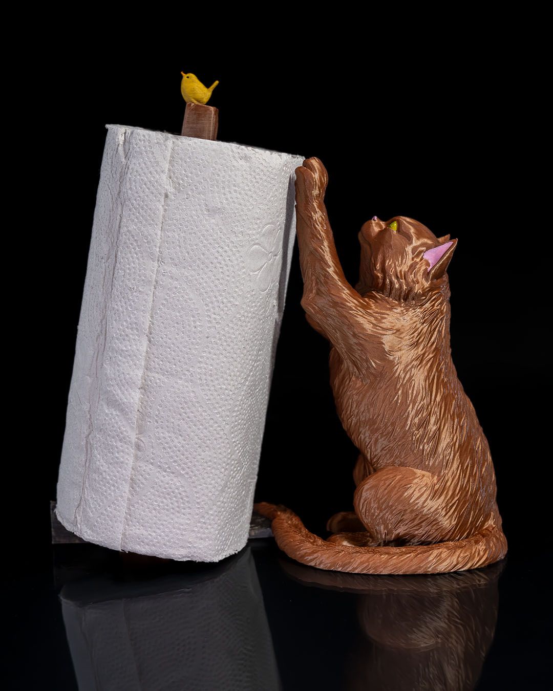 Chat dérouleur d'essuie tout